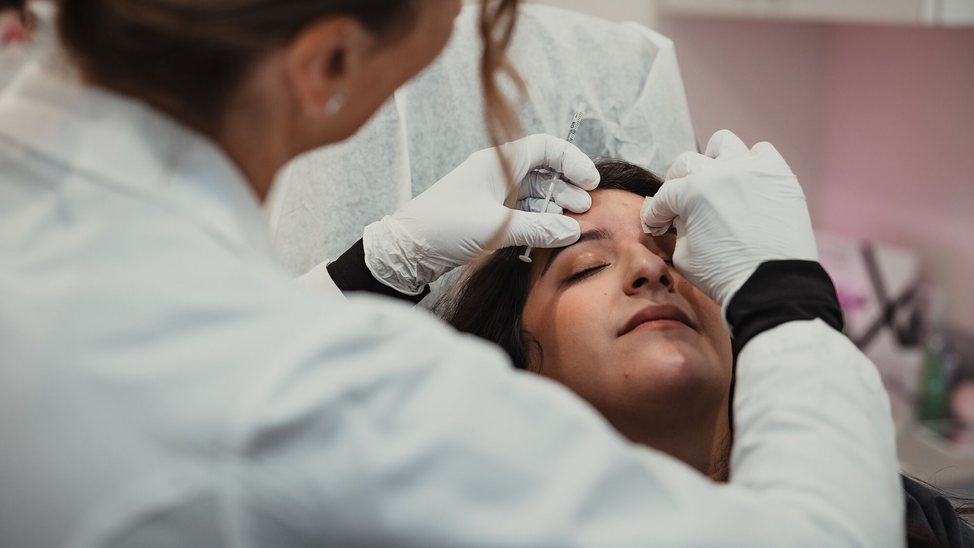 Provider administering a forehead neurotoxin injection at Skin Lab Med Spa in Falls Church, VA
